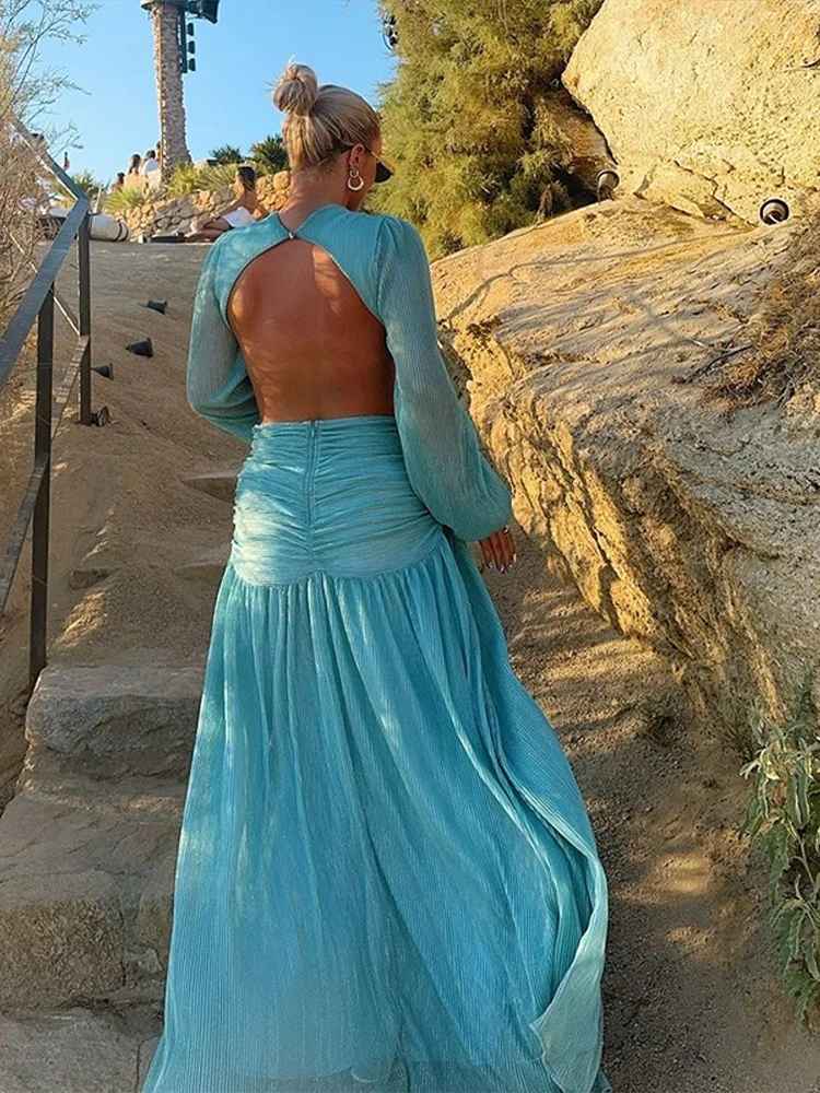💎Maxi dress audacecon décolleté a V sensuale, lavorazioni traforate, schiena scoperta e maniche stile lanterna. Perfetto per serate estive autunnali